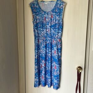 Sleeveless dress with elastic at waist. Polyester